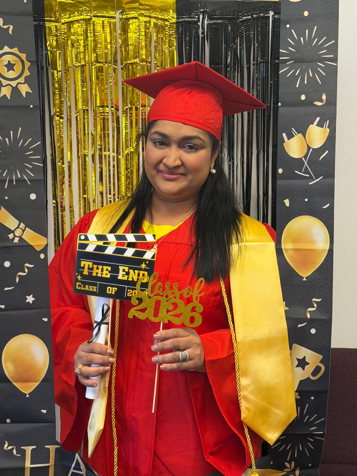1st Cohort Graduation, dressed in red