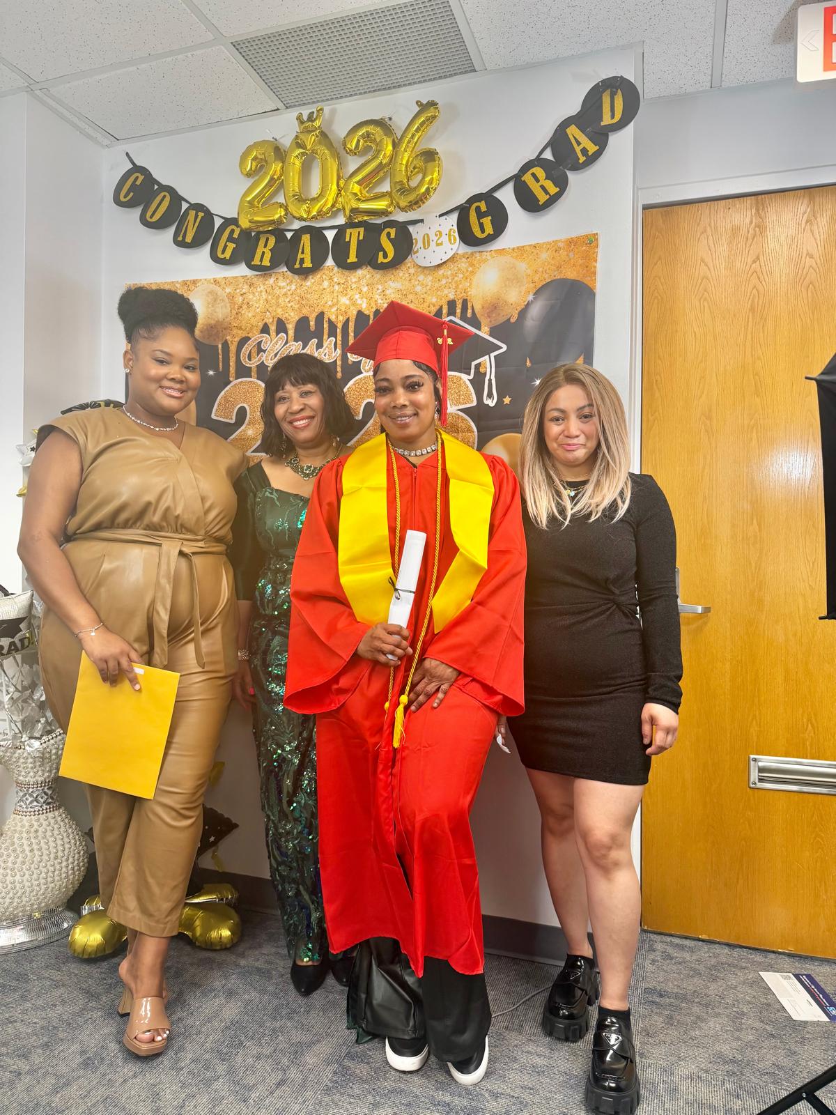1st Cohort Graduation, dressed in red
